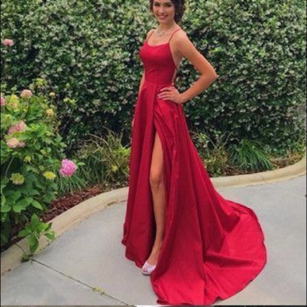 Red flowy Prom dress with crosses on the back